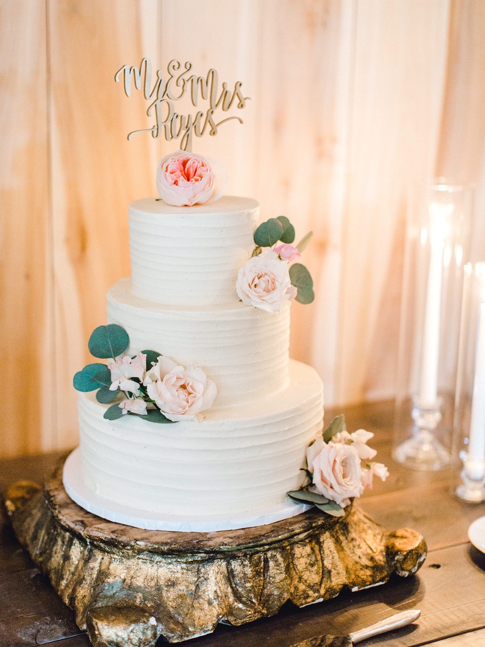 wedding cake in white with floral accents