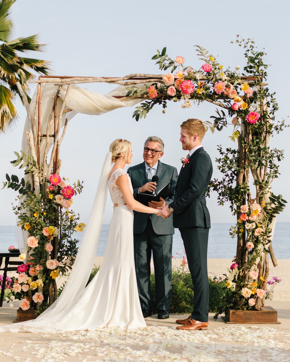 romantic asymmetrical floral wedding arch