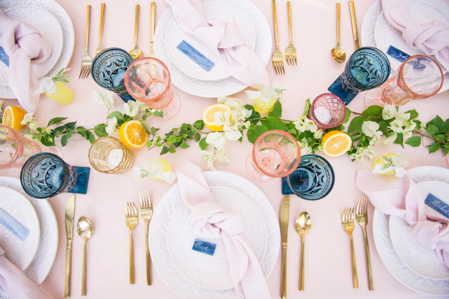 elegant wedding table decor in pink blue and gold