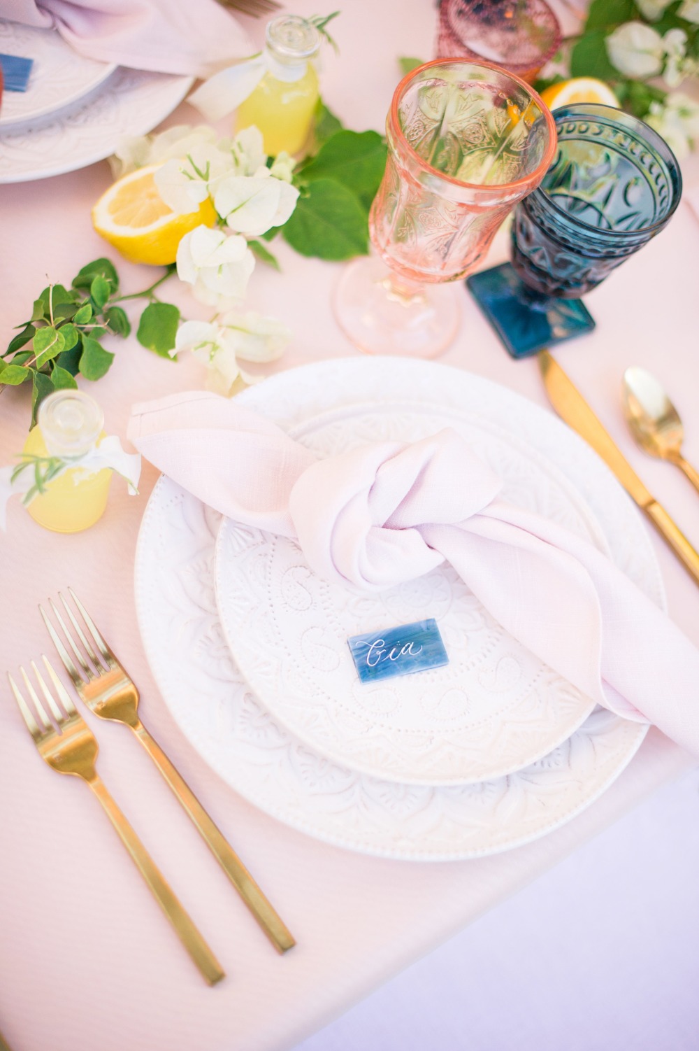 blue and pink and gold wedding place setting