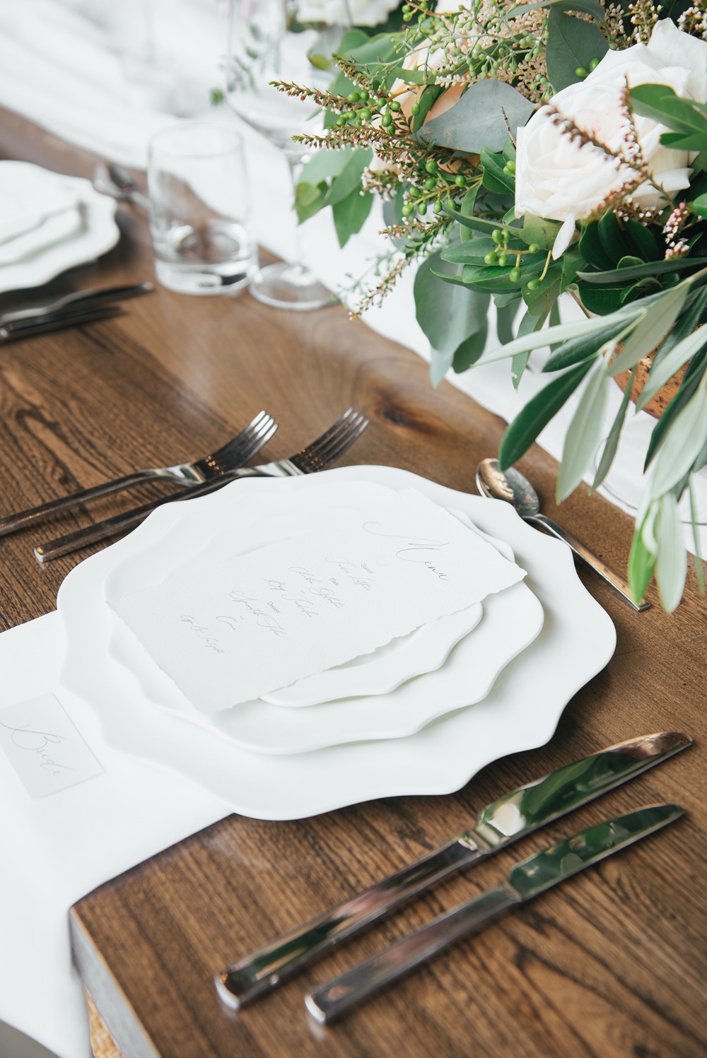 all white wedding place setting