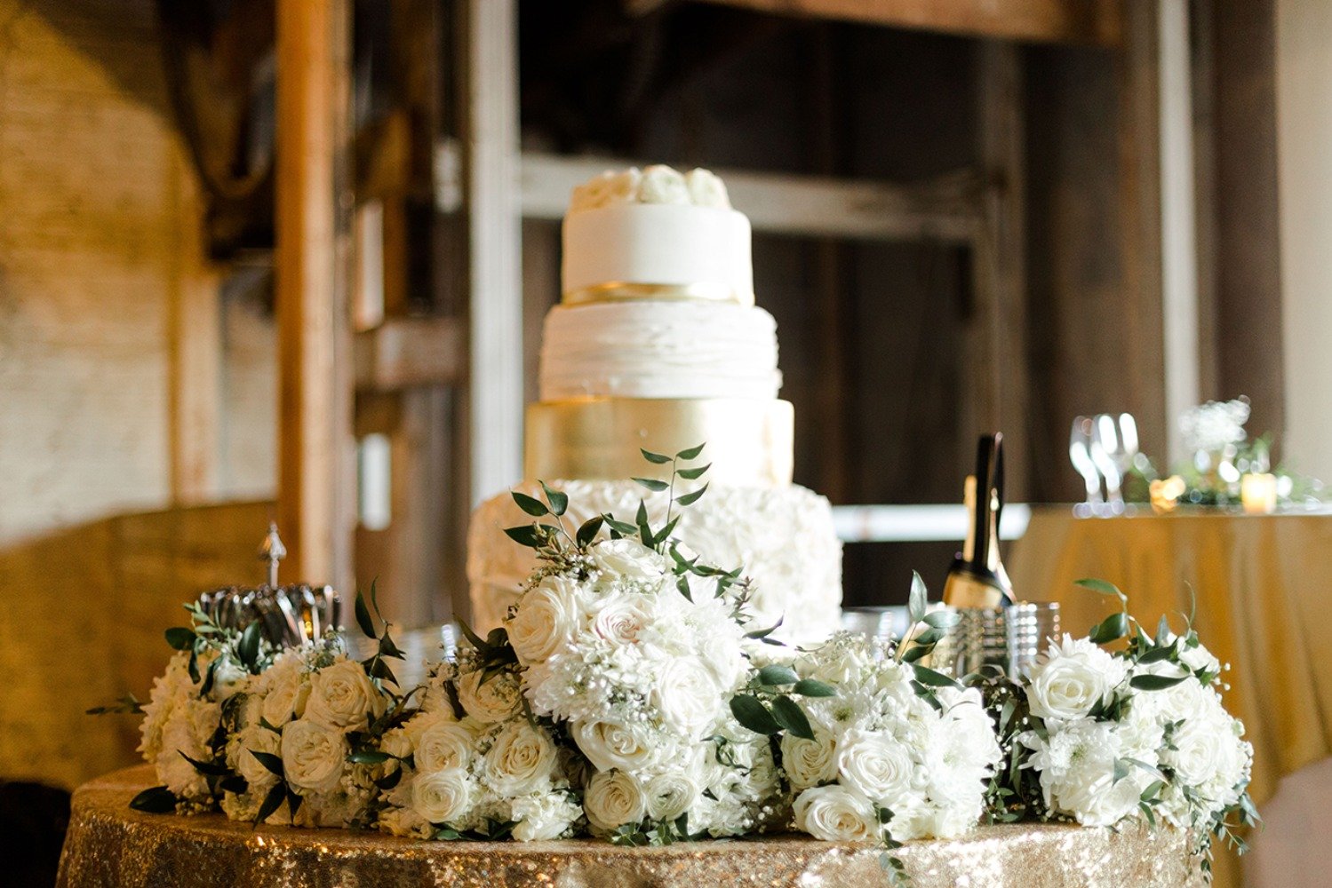 white and gold wedding cake