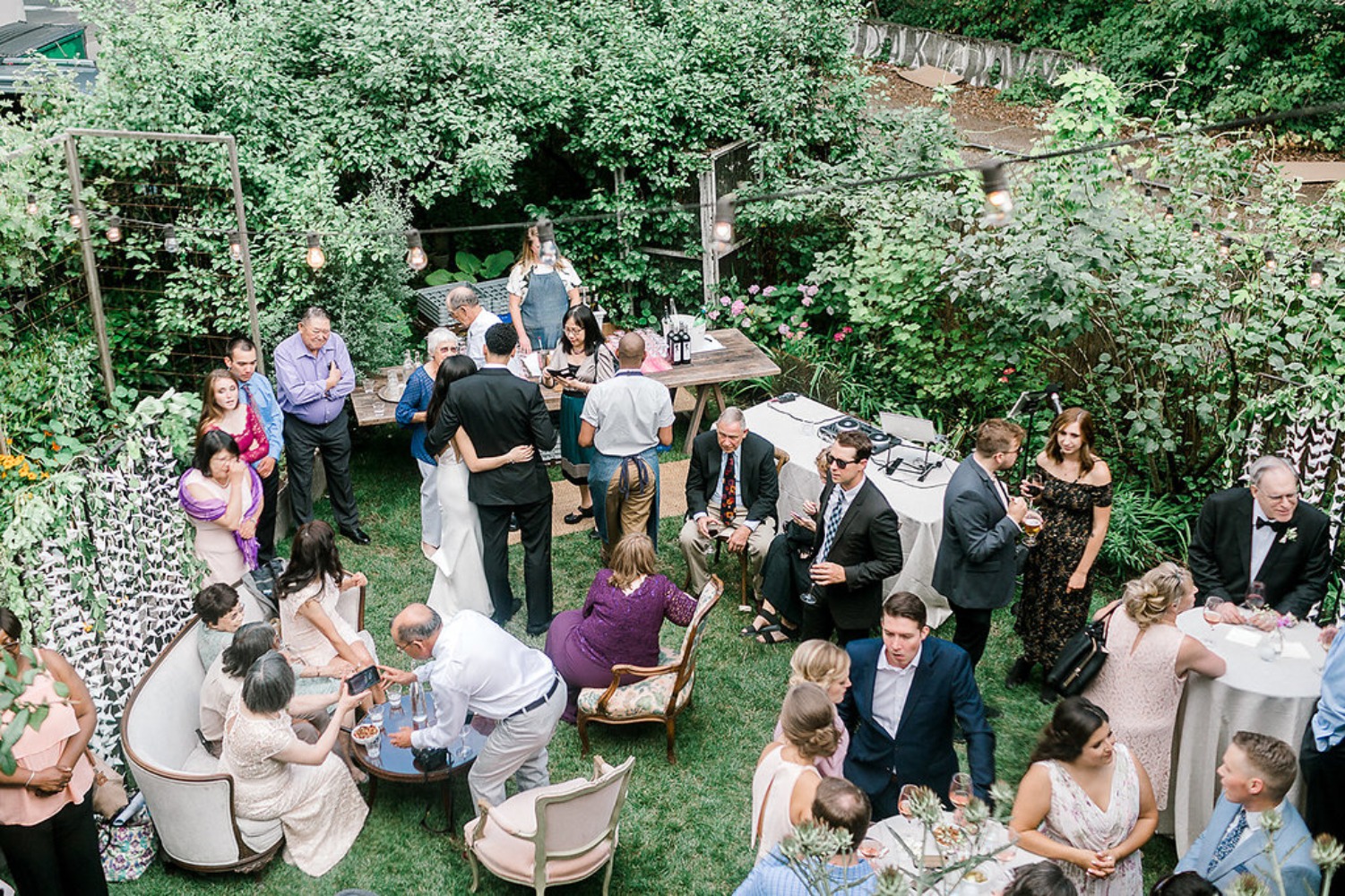 Outdoor wedding reception in a lush garden setting