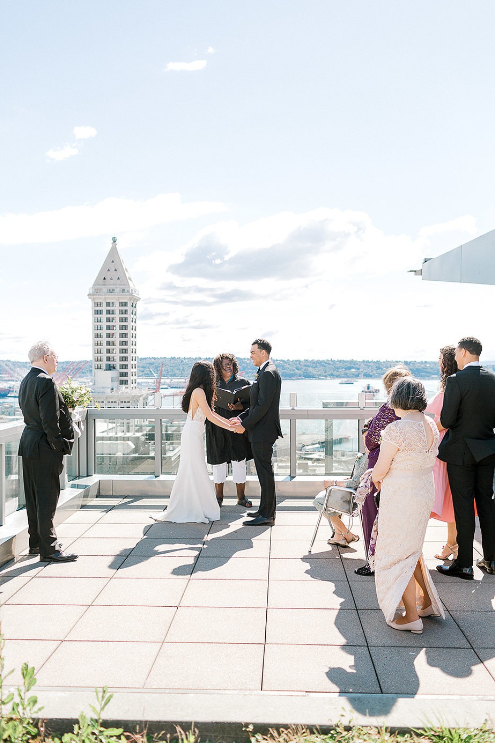 Bride and groom at Seattle rooftop wedding ceremony