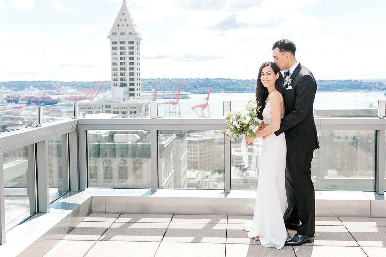 Seattle rooftop wedding happy couple embraces outdoors