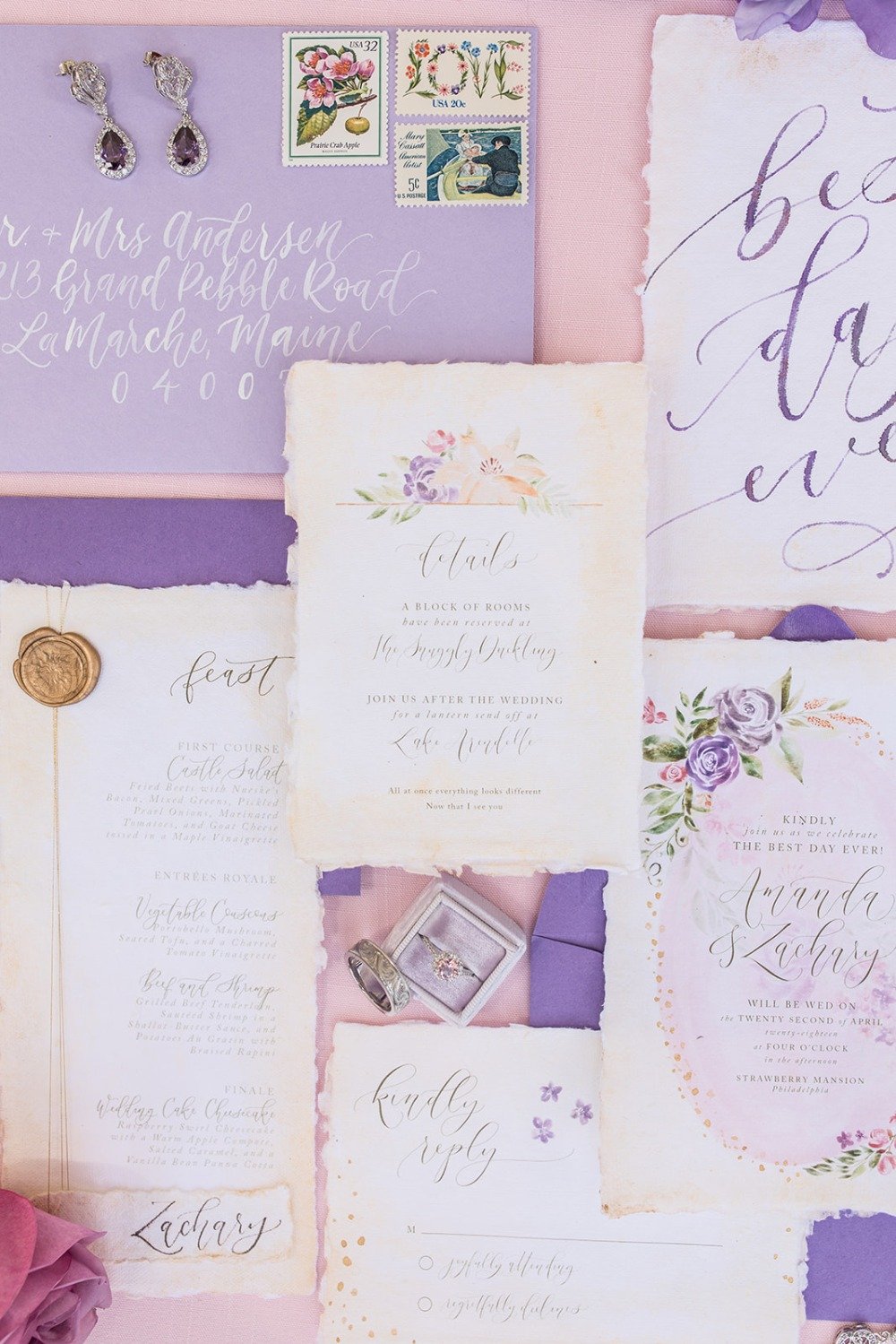 purple floral themed wedding invitation suite