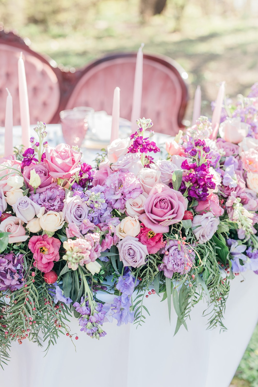 romantic pink and purple wedding flowers for your sweetheart table