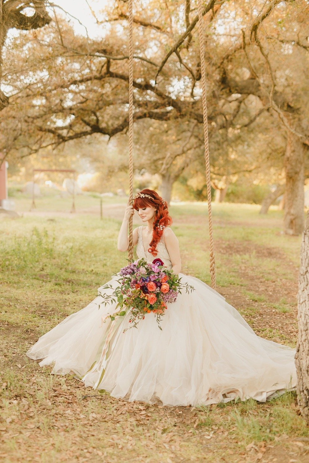 Floral Fairytale Shoot at Heavenly Oaks Flower Farm Bride on Swing