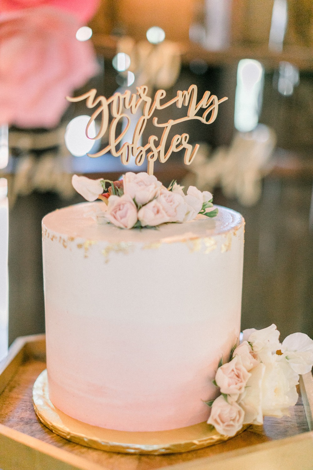 watercolor wash and gold leaf modern wedding cake