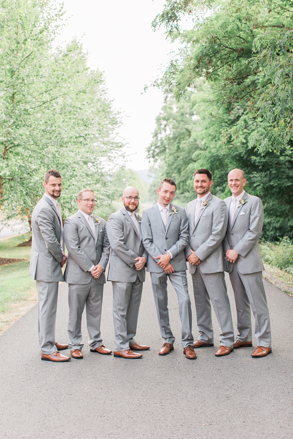 light grey groomsmen suits