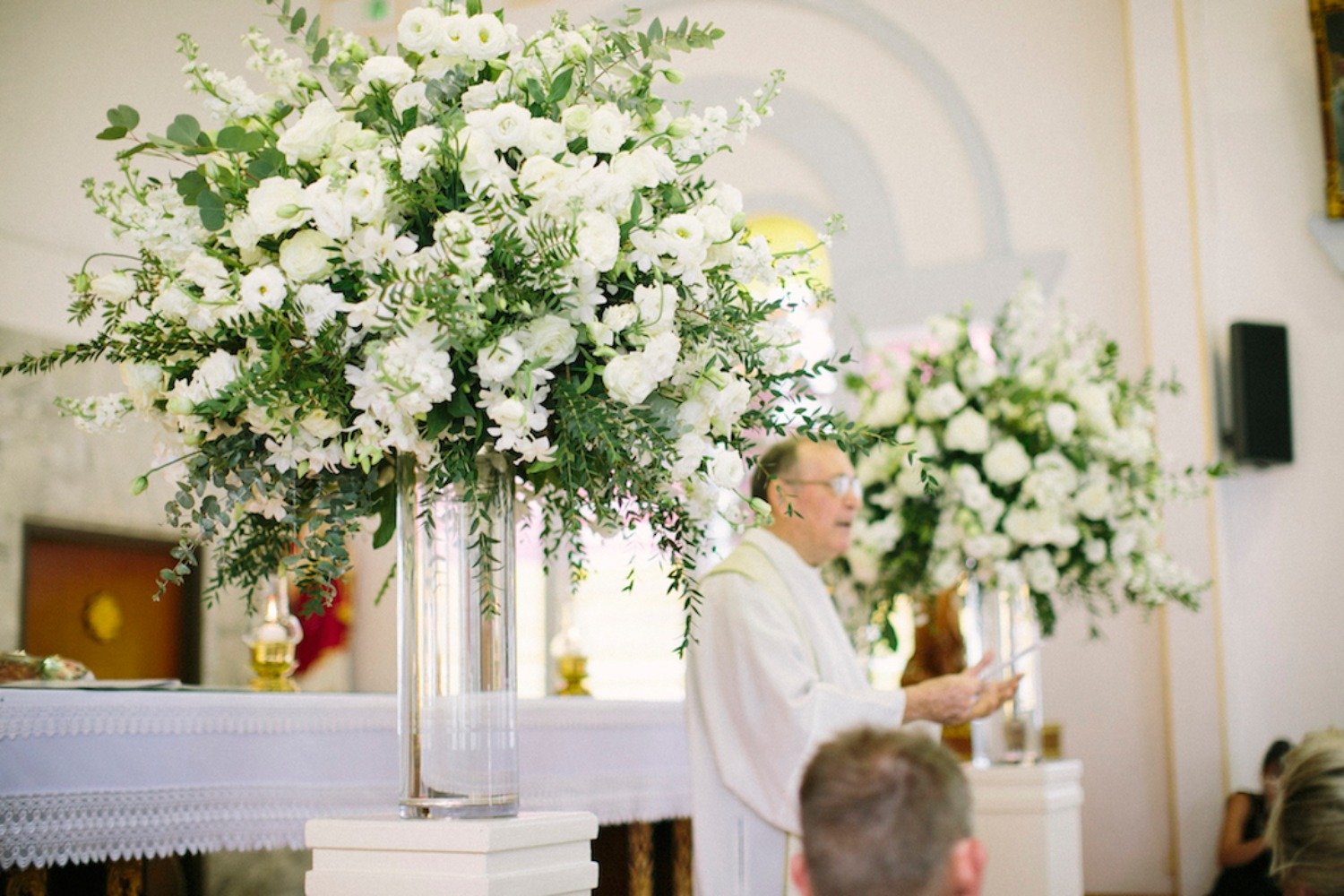all white and greenery wedding floral decor