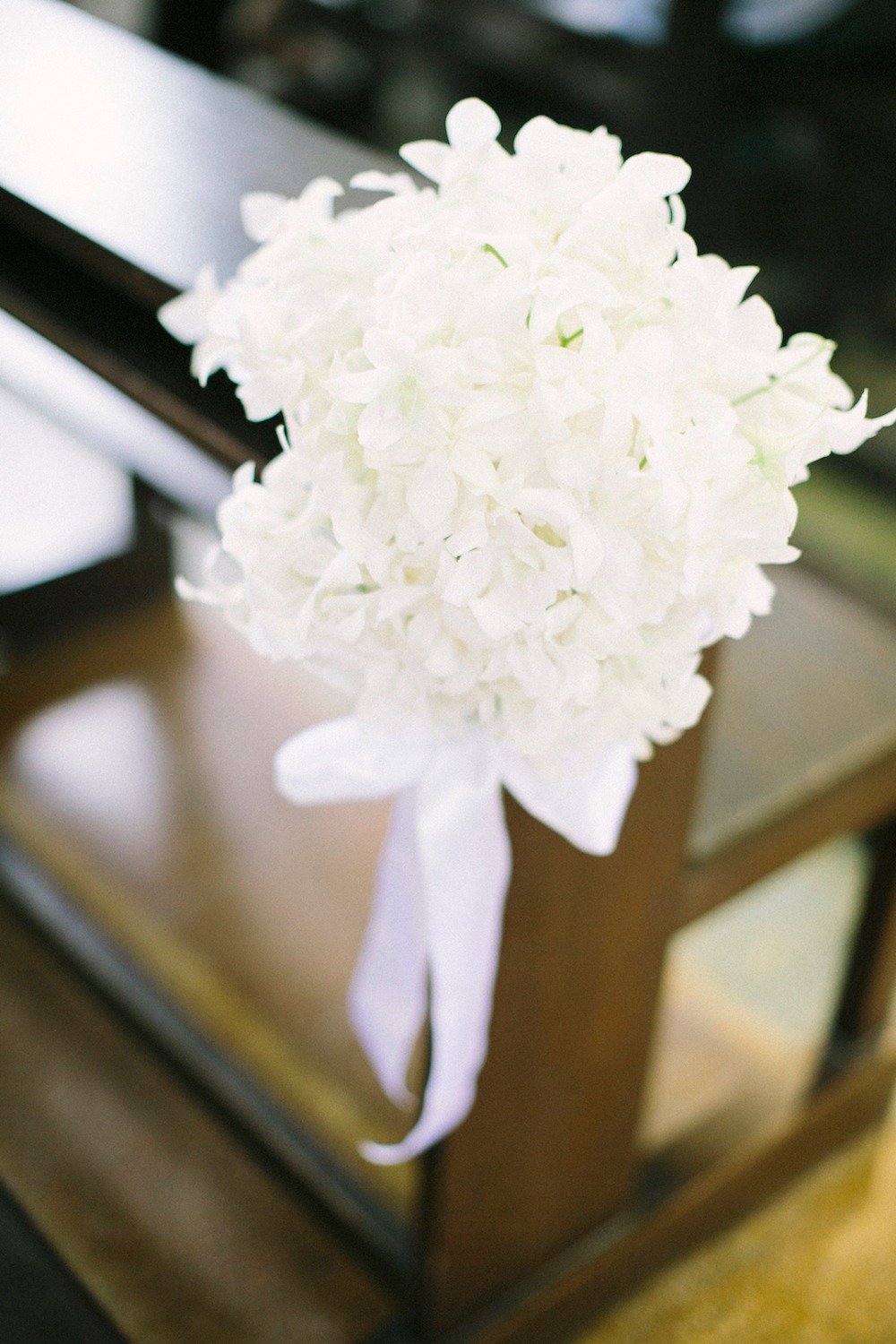 all white wedding aisle floral decor