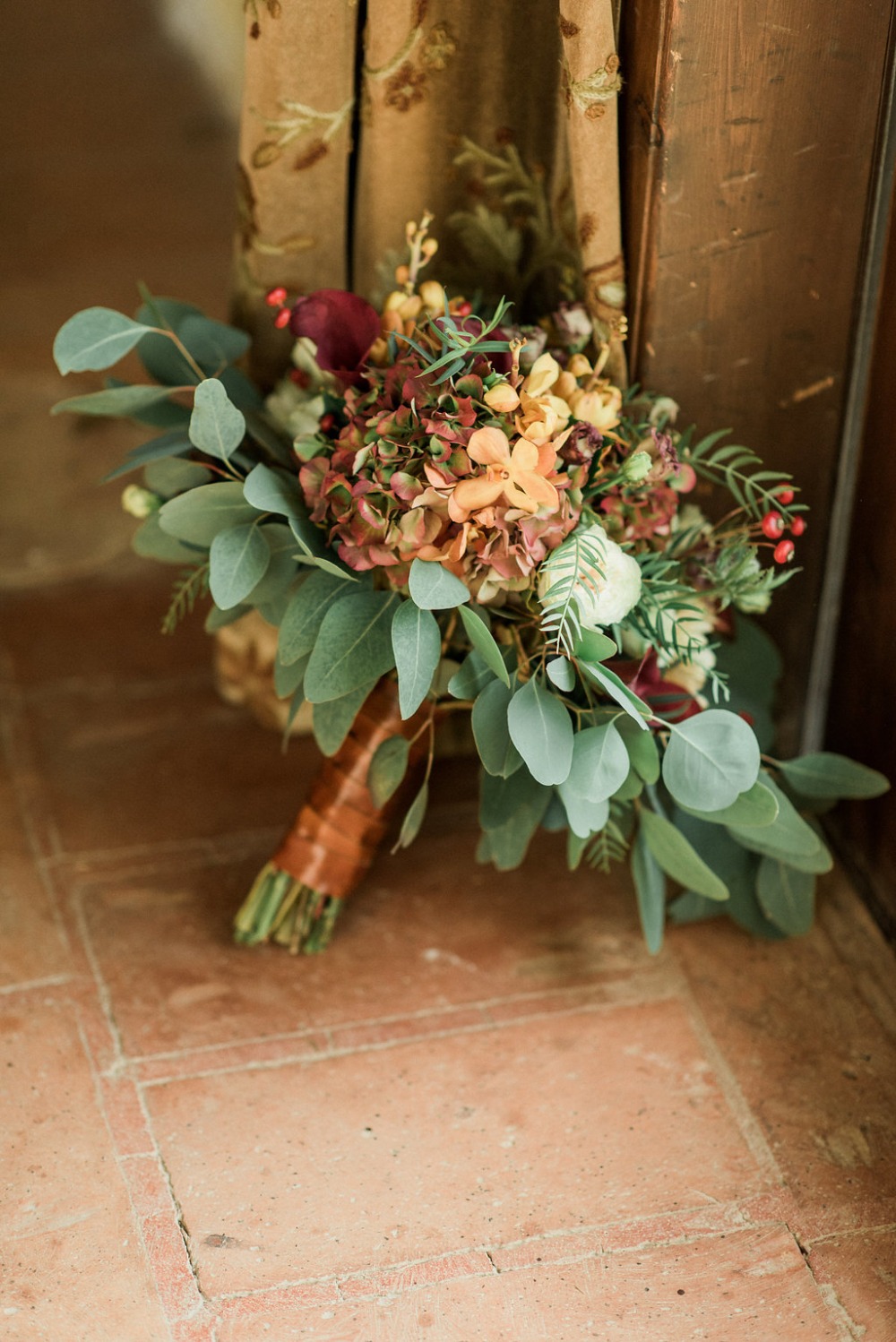 wedding bouquet in red and orange