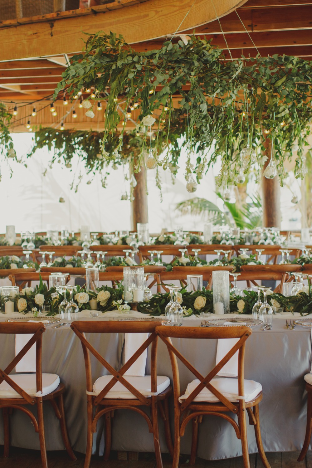 Wedding reception with greenery and floral decorations