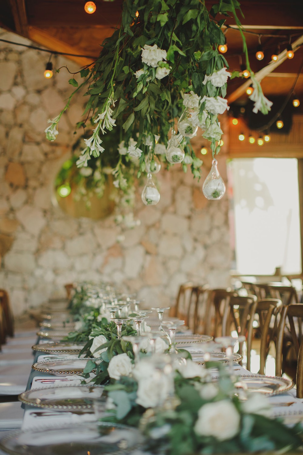 glamorous table setting with hanging flowers