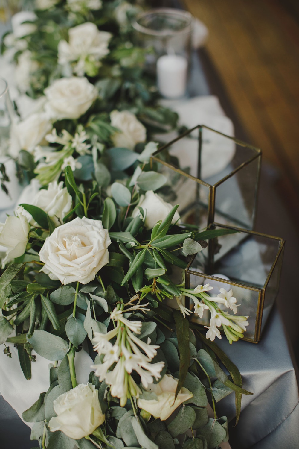 white and green florals with candles
