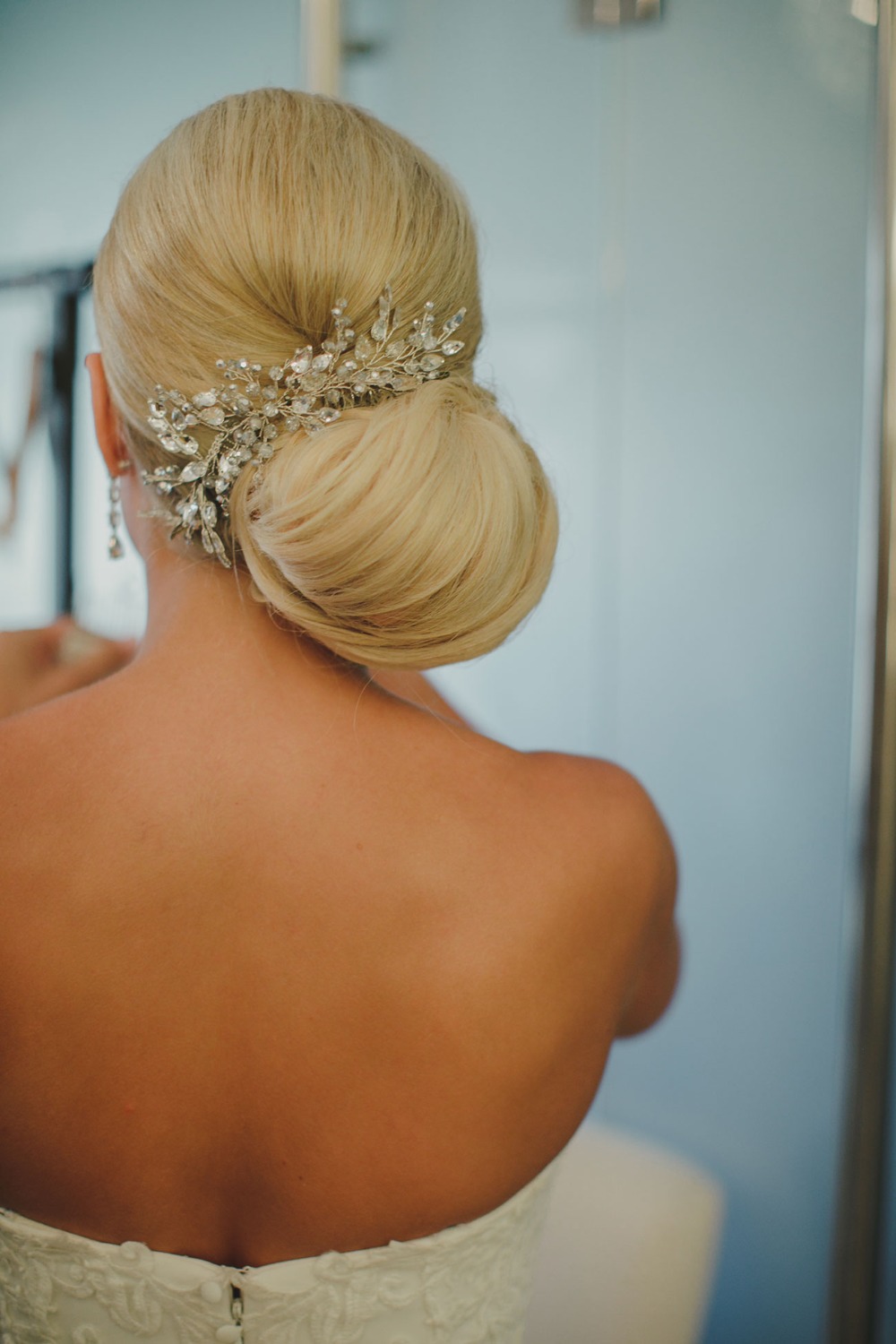 glamorous bridal up do with sparkly hair accessory