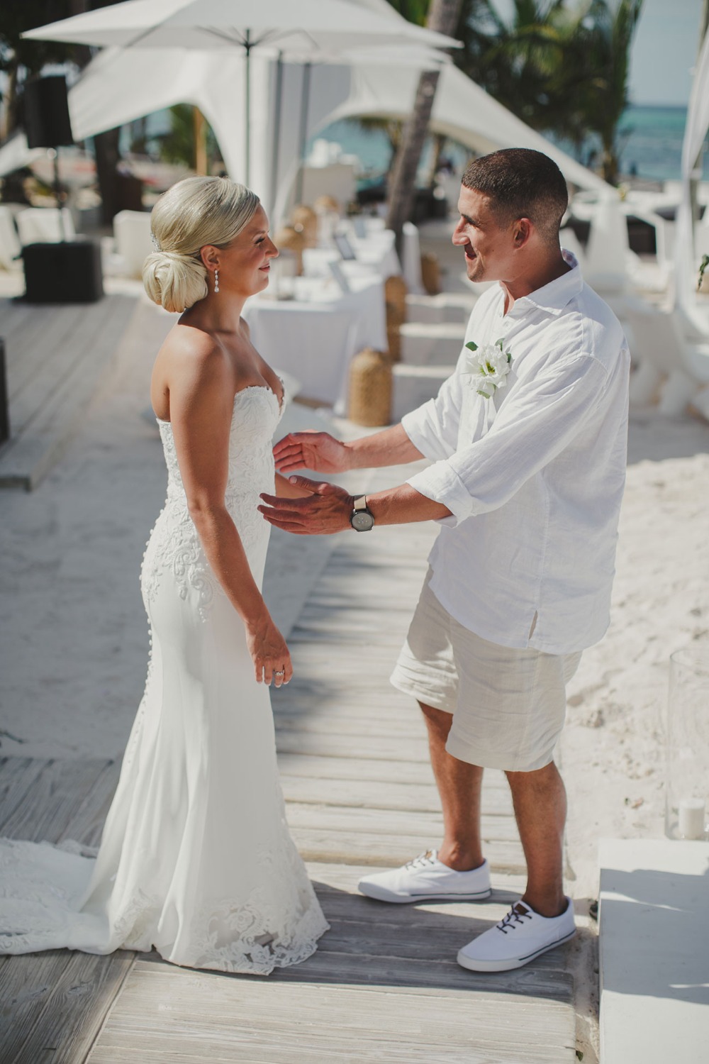 Bride and groom sharing a joyful moment on their wedding day