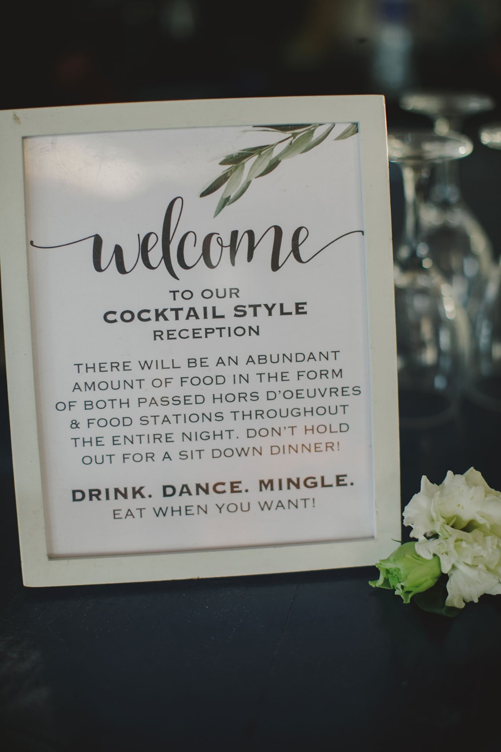 Wedding cocktail reception welcome sign with elegant script