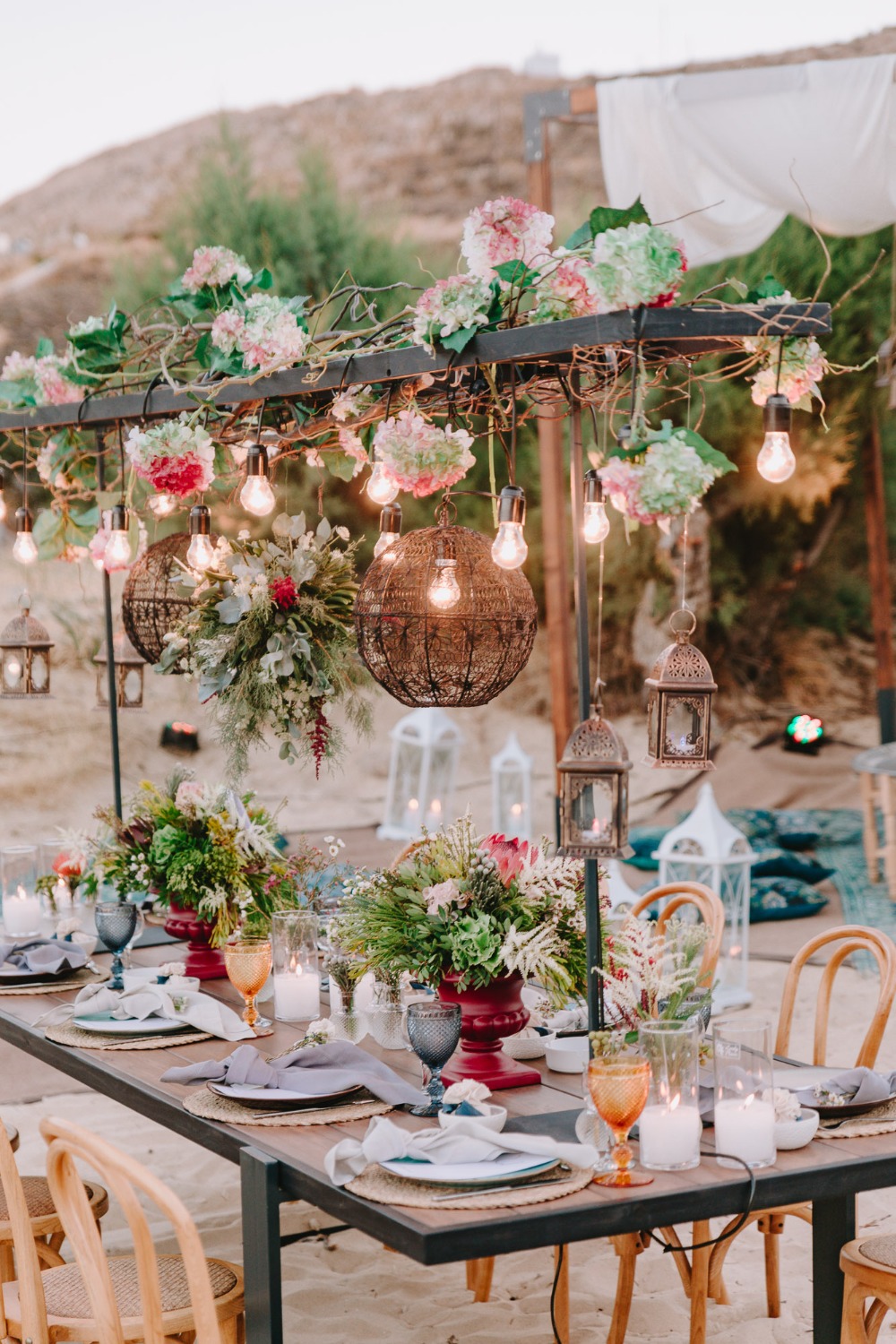 Wedding table decor idea with hanging lights