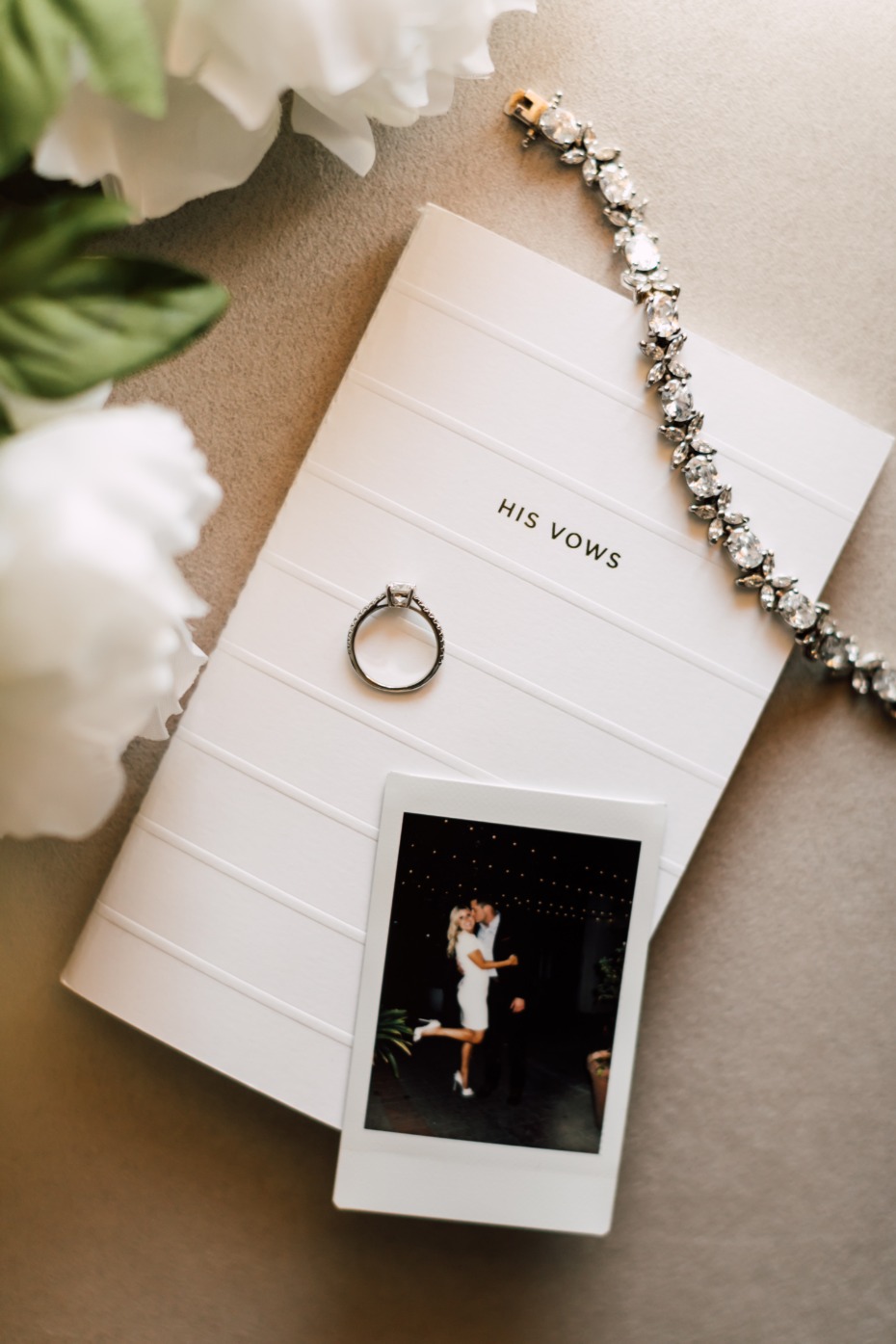 Wedding details His Vows book ring and photo booth pic