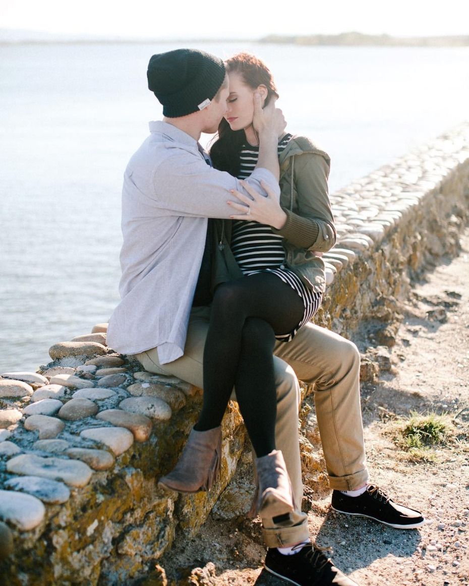 Romantic couple embracing by the sea