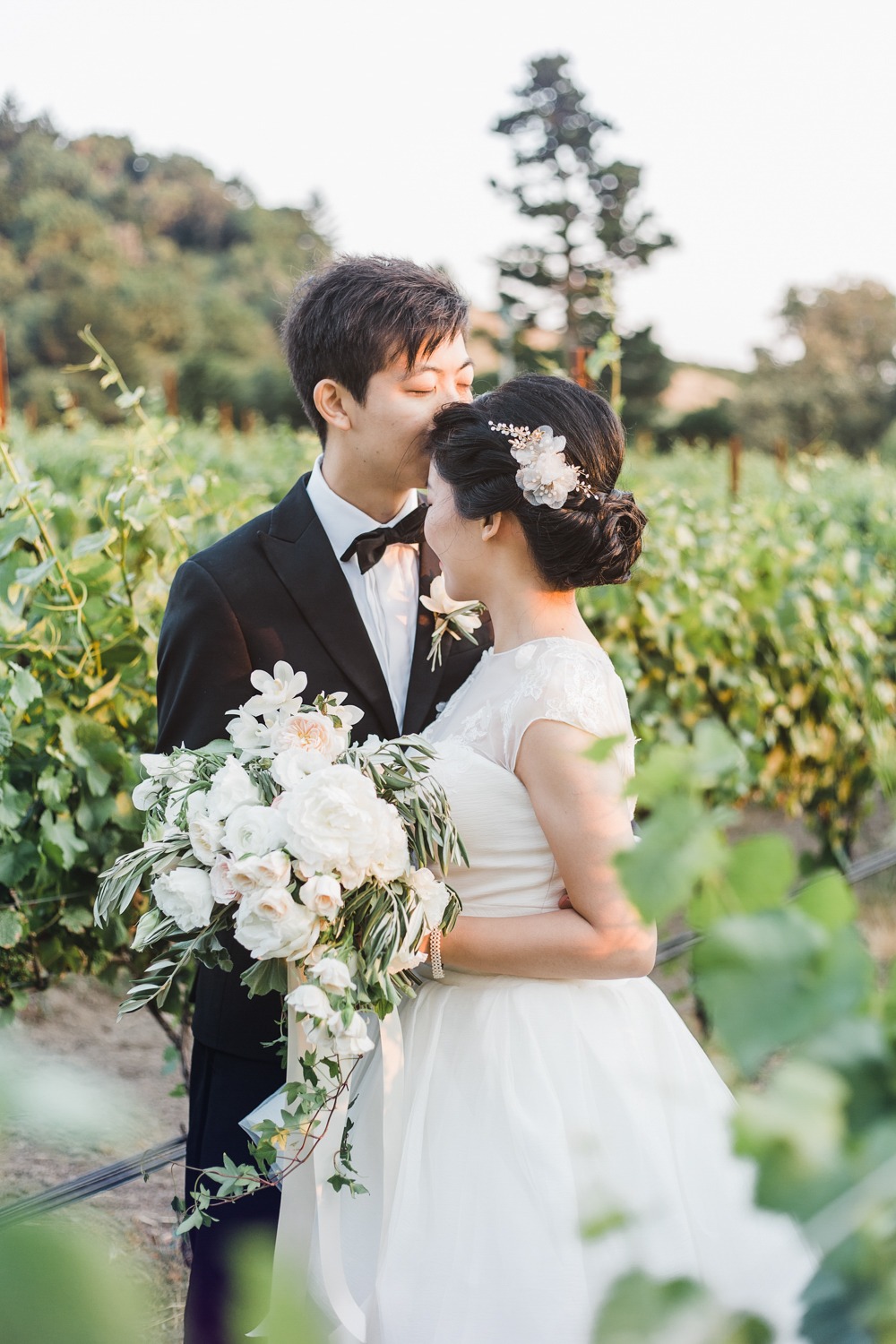 sweet wedding couple in a vineyard