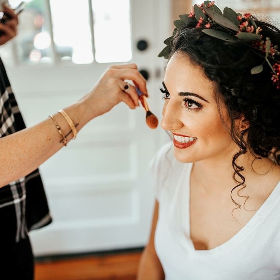 bride-getting-makeup-done-by-femme-akoi-studio