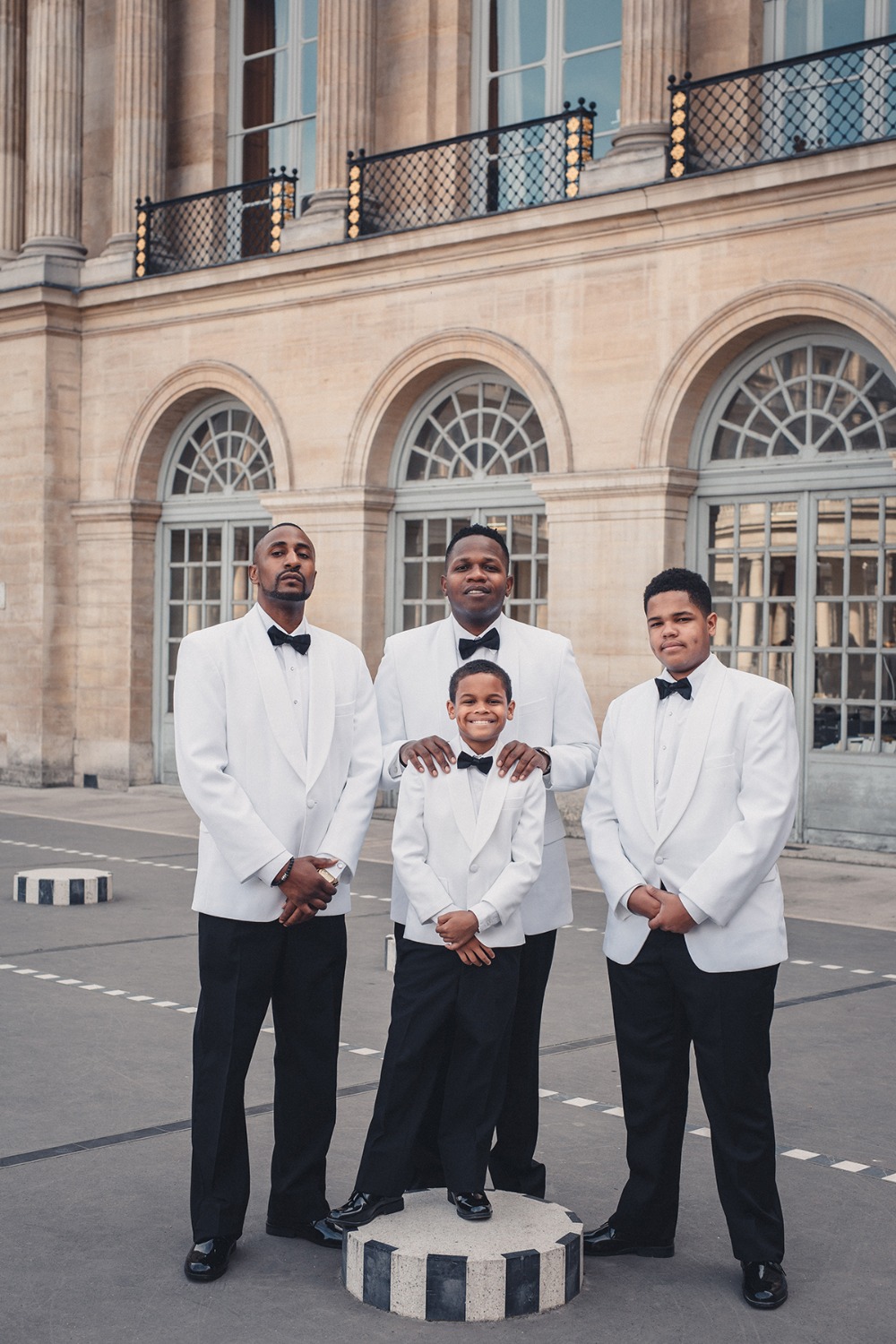 Groom and his men in white
