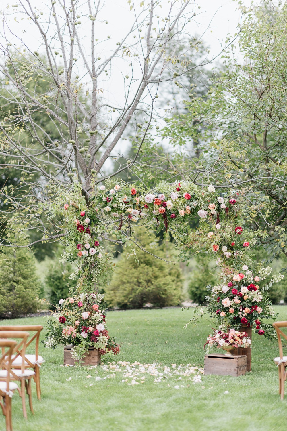 Rustic rose wedding arbor