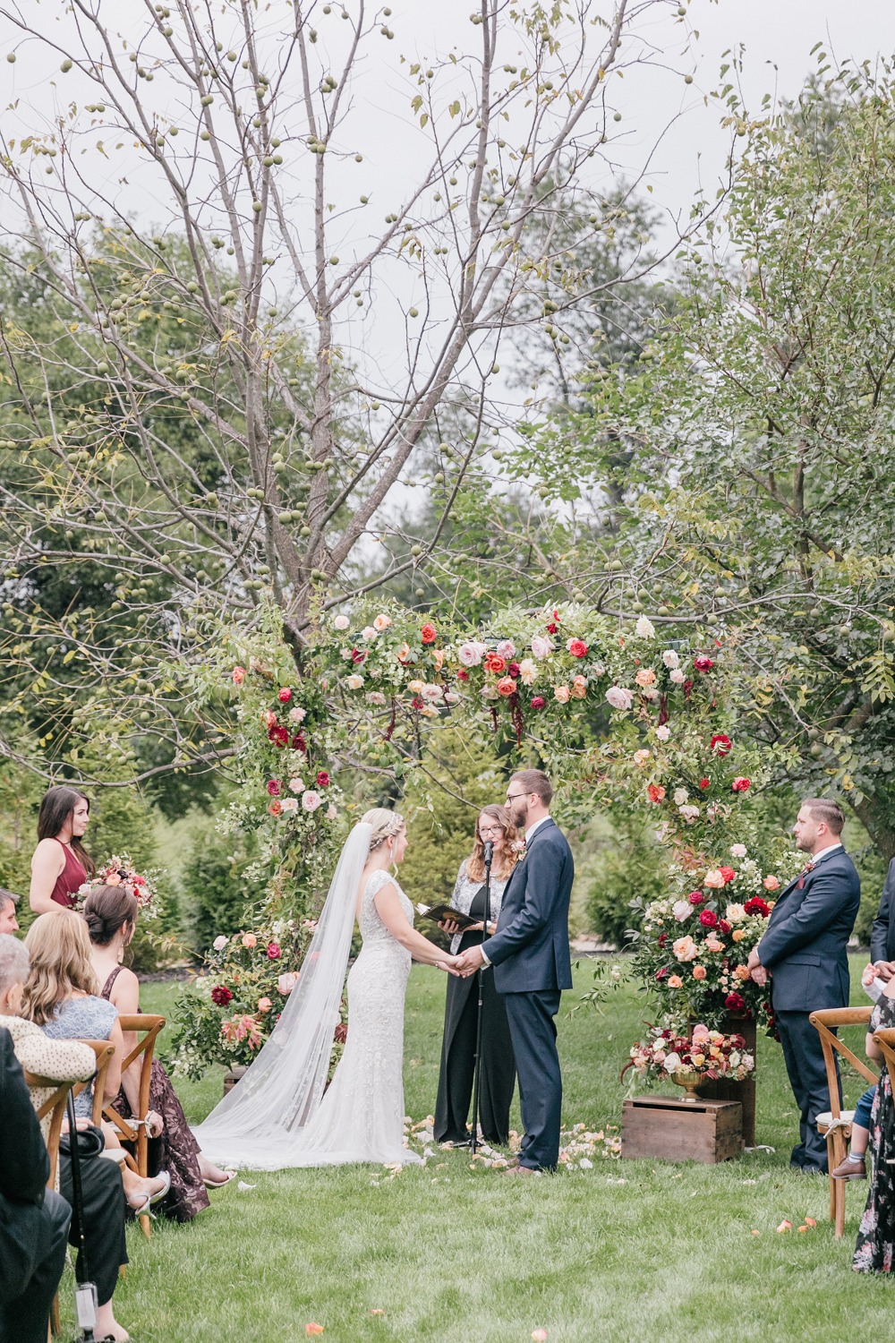 Outdoor rose wedding arbor