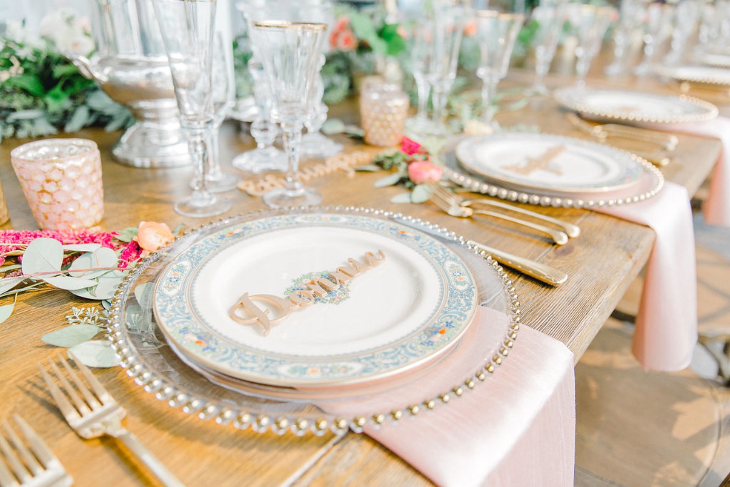 Gold and blush table setting for a wedding
