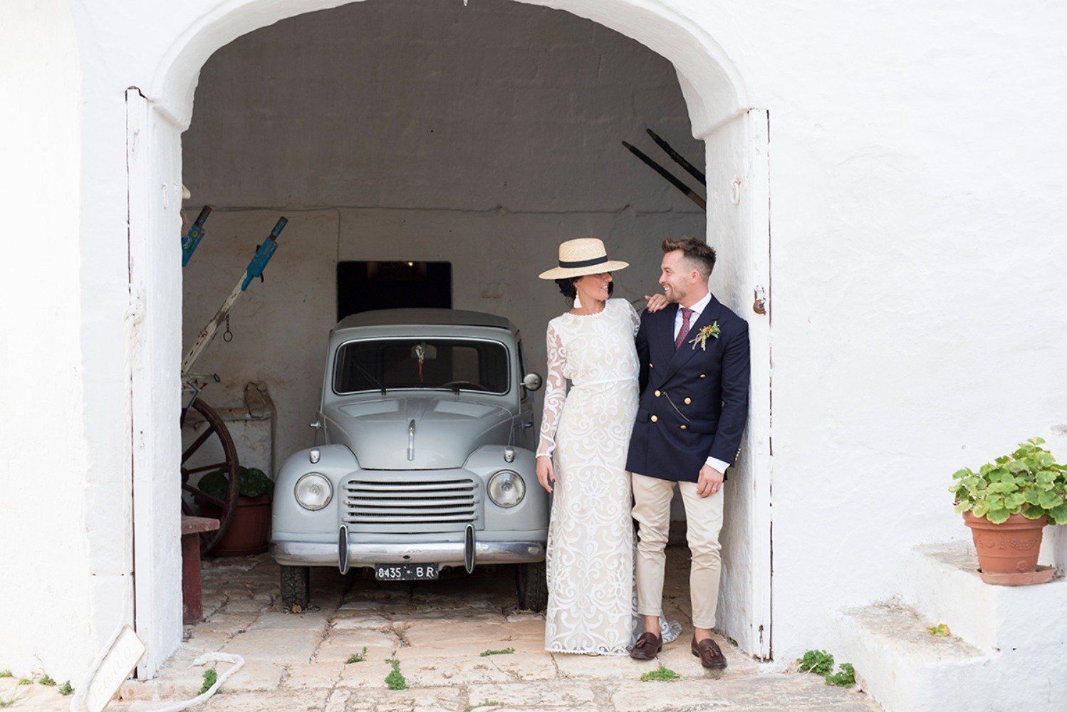 sweet wedding couple with vintage car