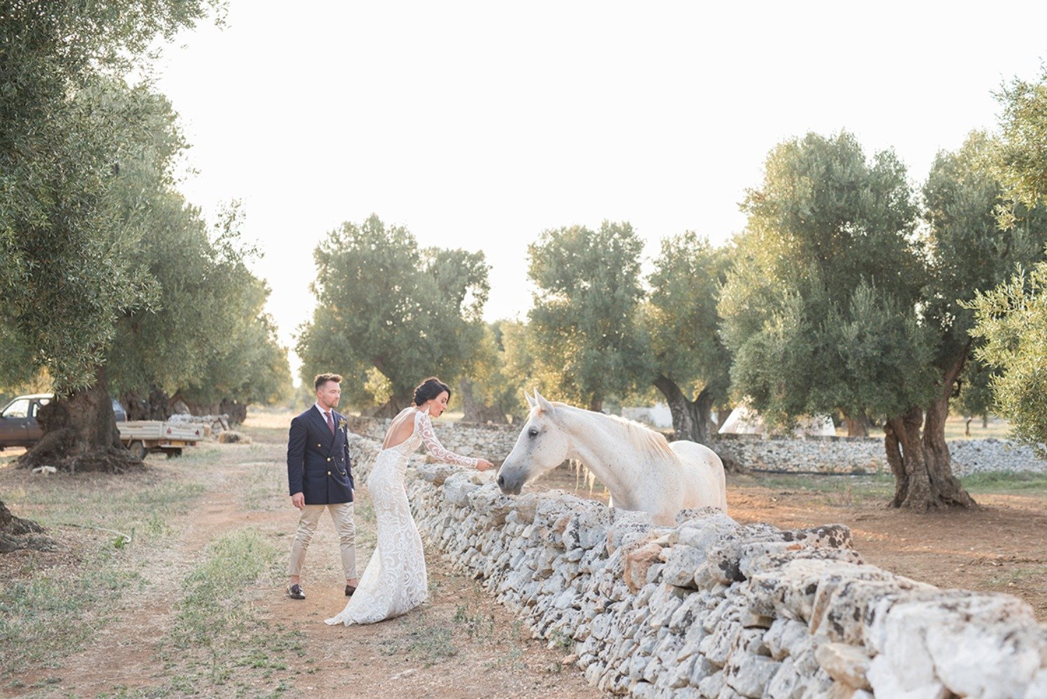 sweet candid wedding couple and horse