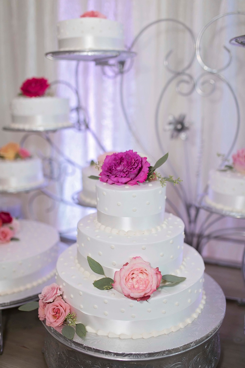 flower topped polka dot wedding cakes