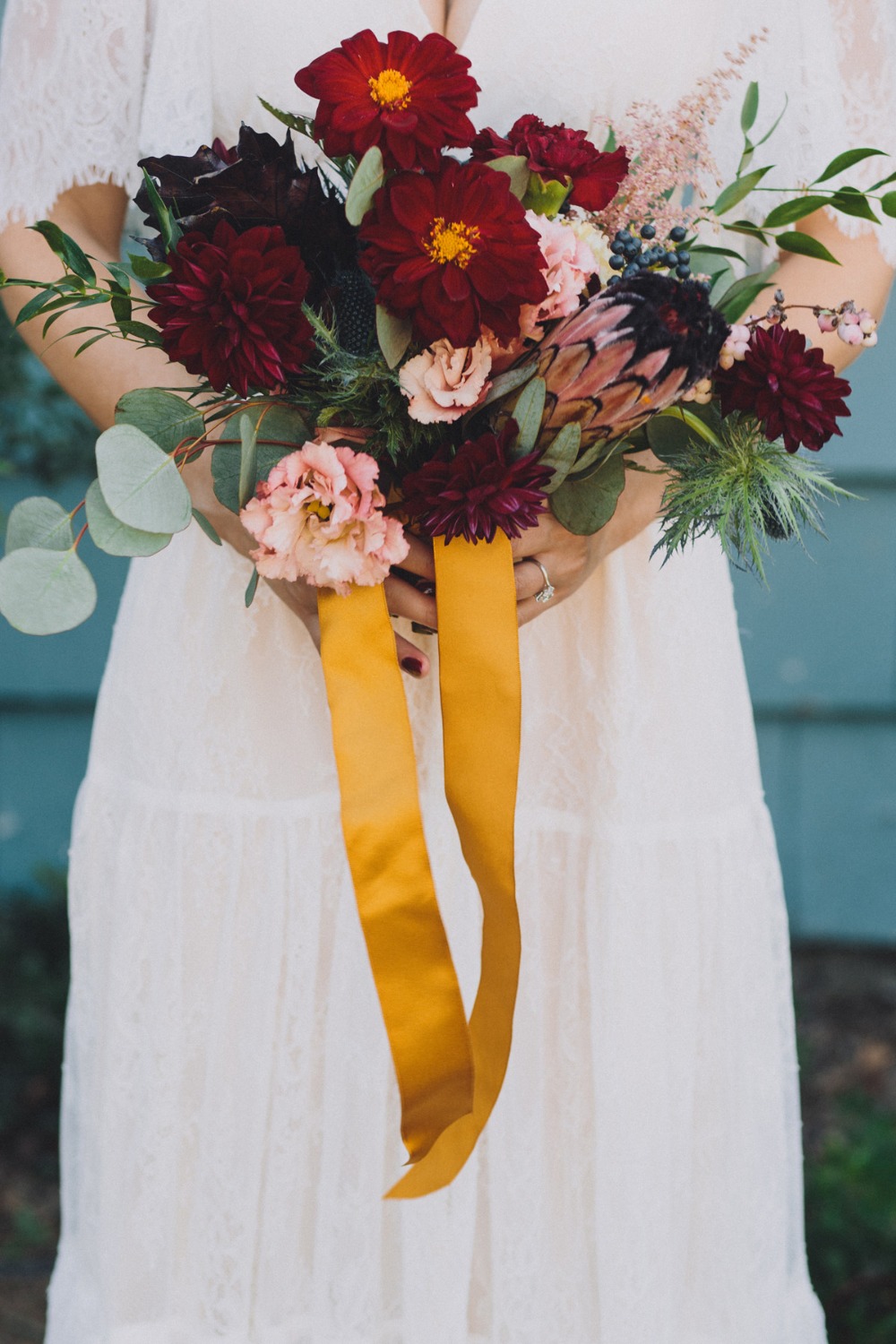 Wedding bouquet with yellow ribbon