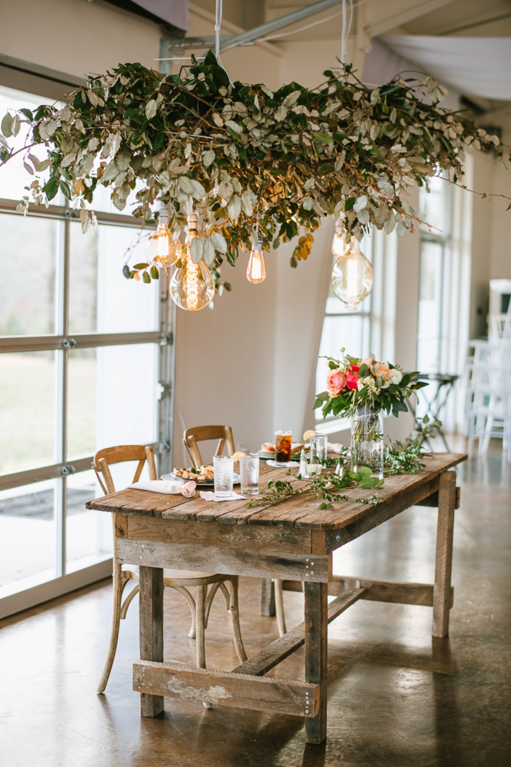 rustic sweetheart table with cascading greenery chandelier