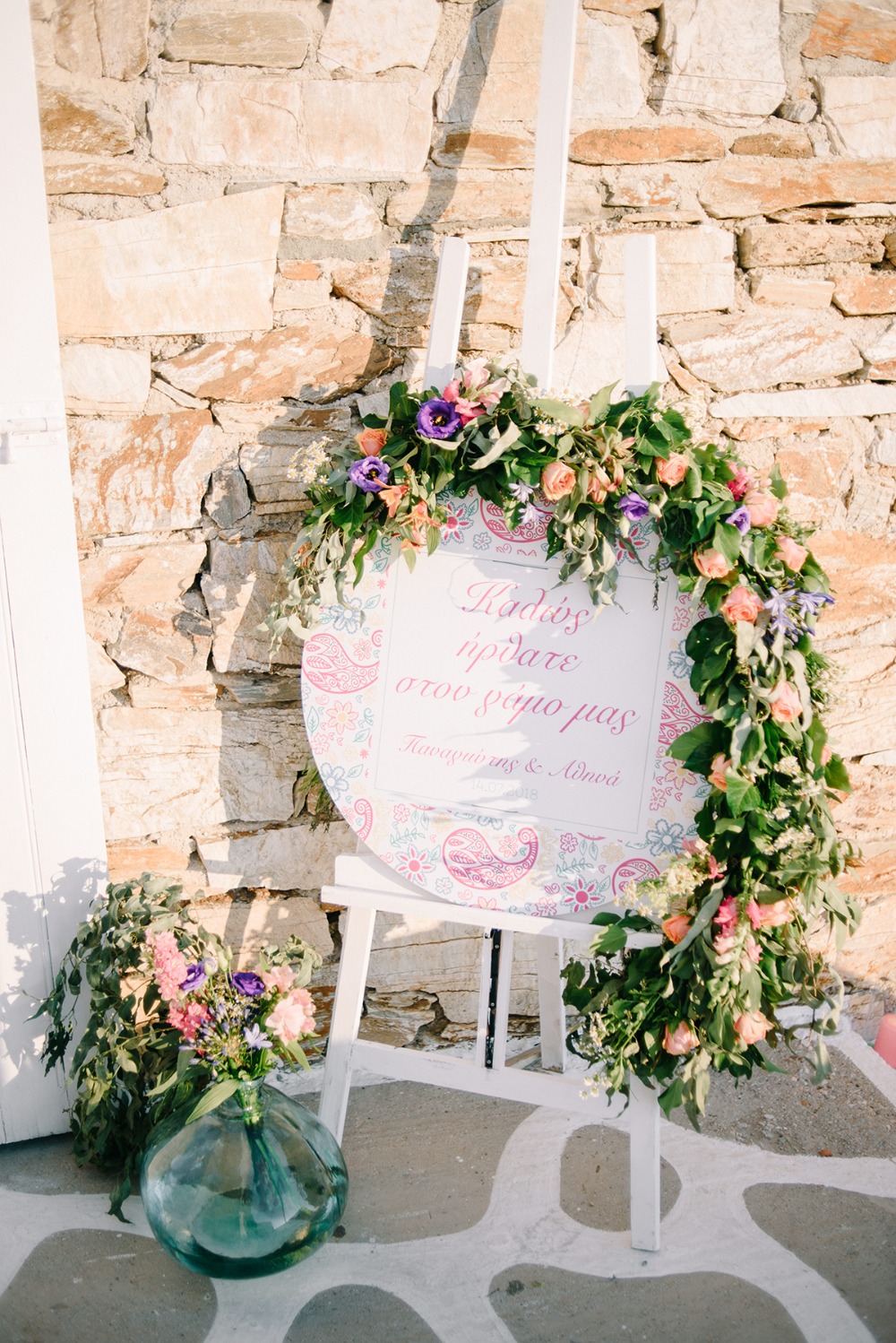 wedding sign with floral garland
