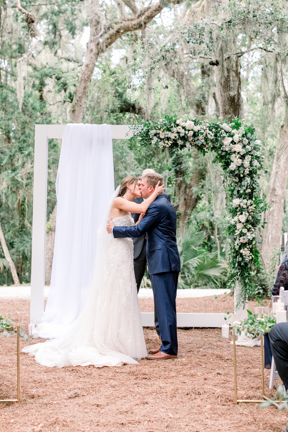 Outdoor ceremony with square arch