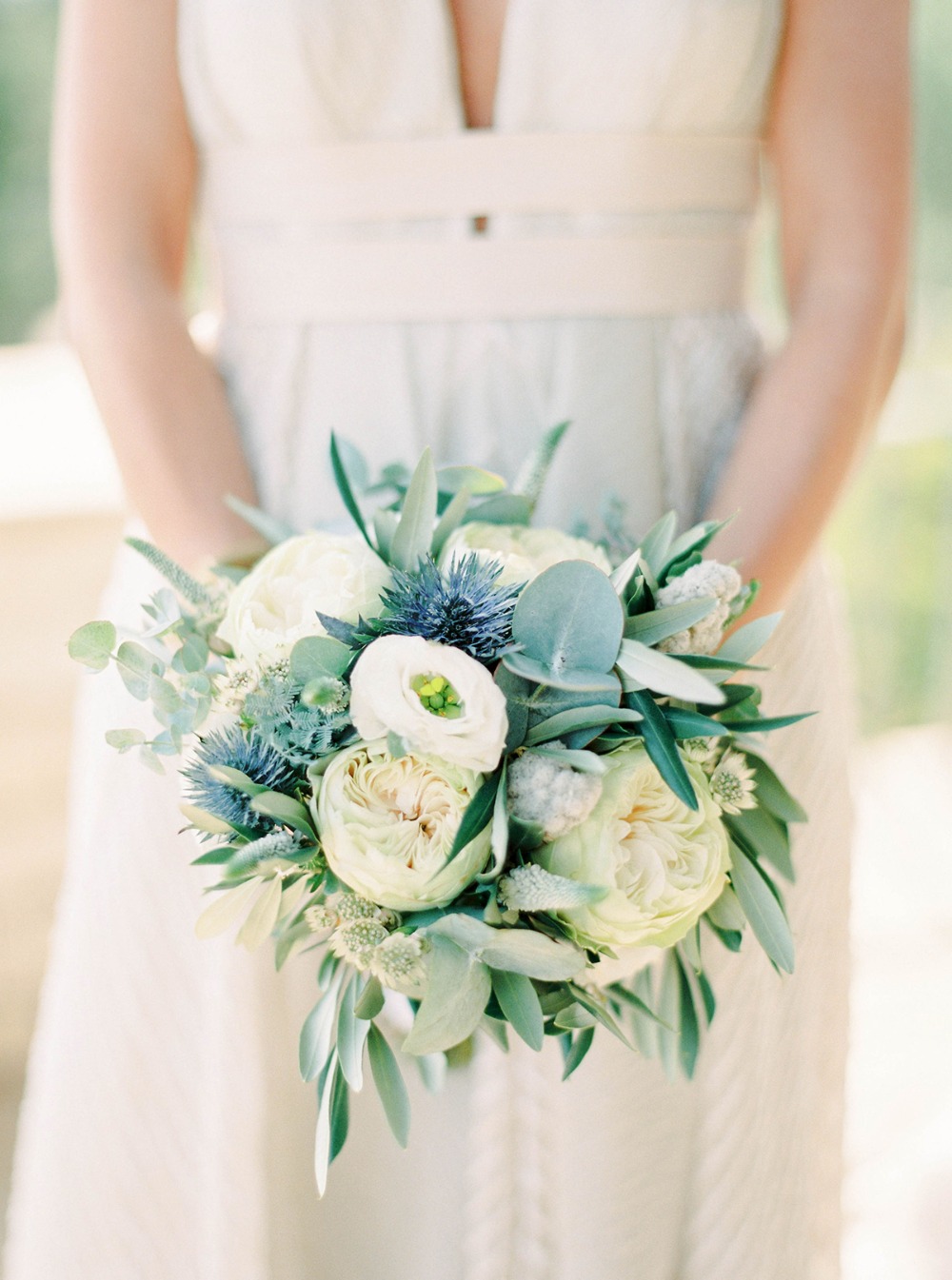 white and blue thistle wedding bouquet
