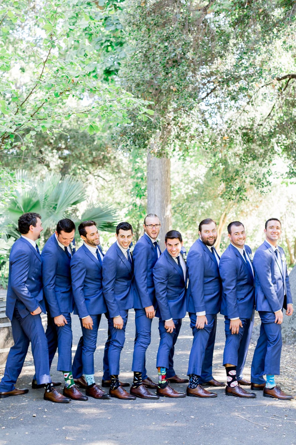 groom and groomsmen in royal blue suits