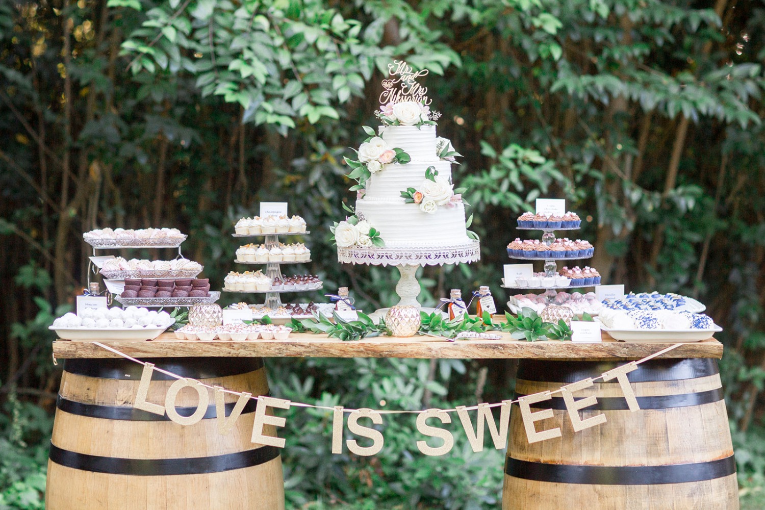 love is sweet wedding cake table
