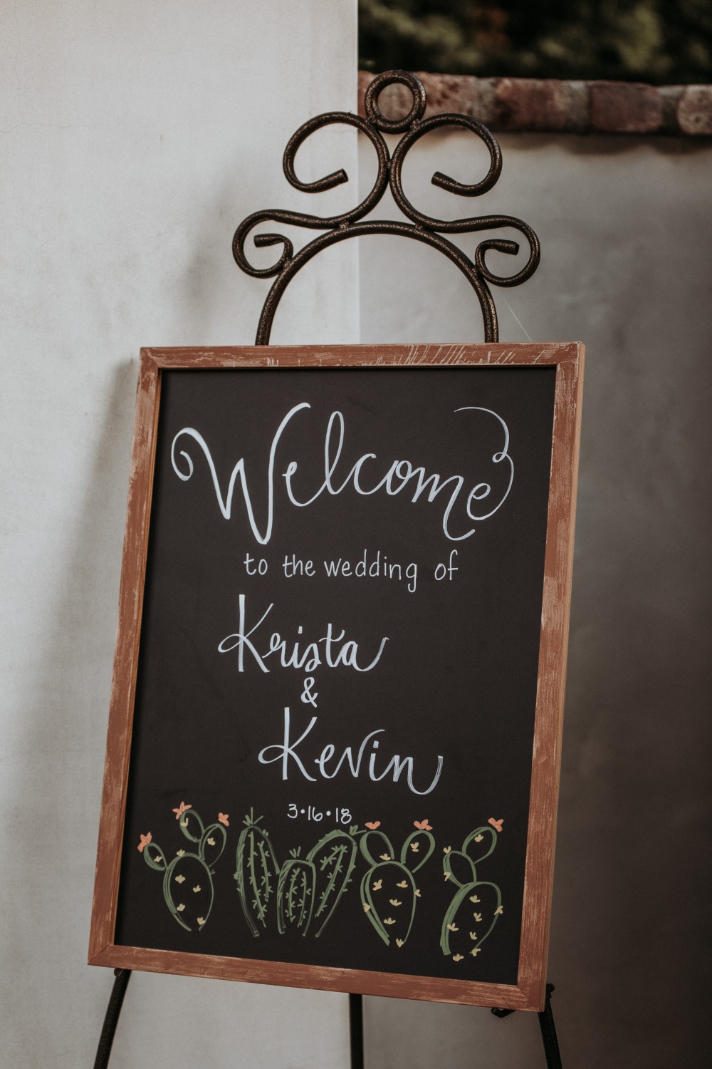 Wedding welcome sign with Krista and Kevin cactus design