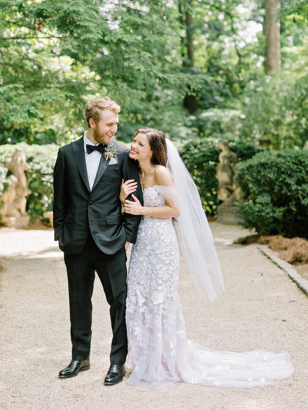 Happy bride and groom on wedding day in garden