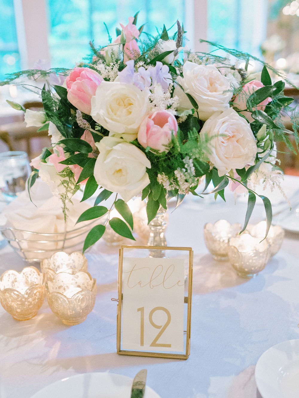Elegant wedding table setting with floral centerpiece