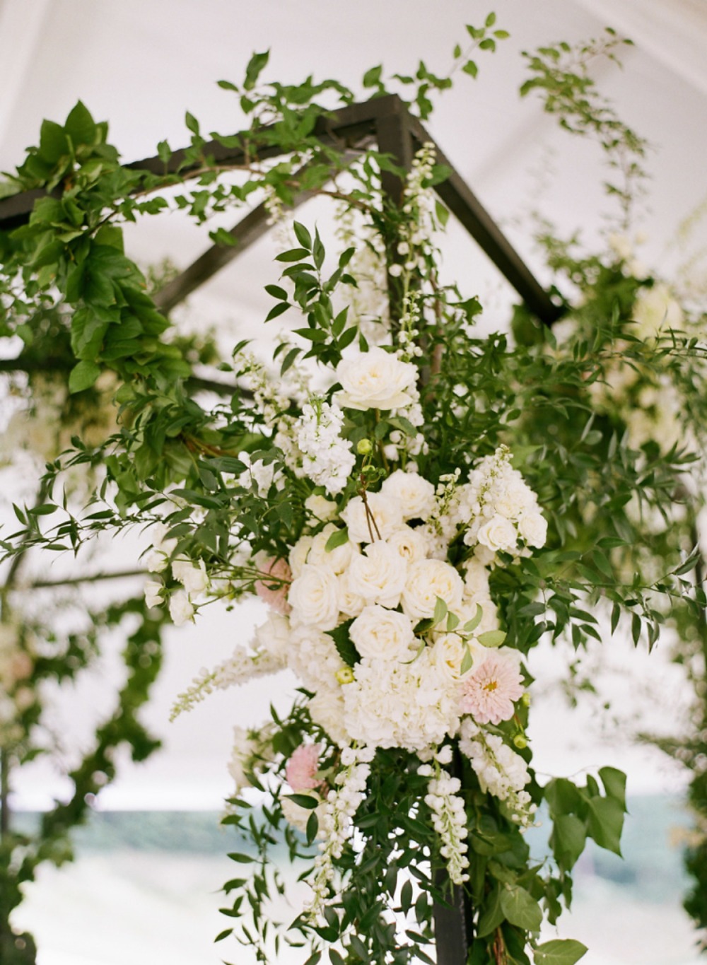 floral covered wedding arch