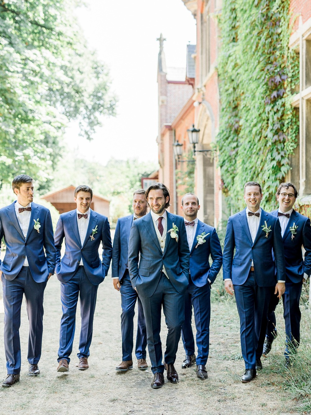 Navy blue suits for the groom and his men