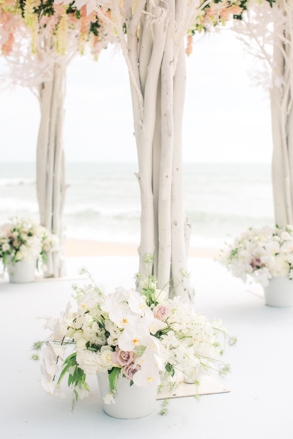 Ceremony florals for a beach wedding
