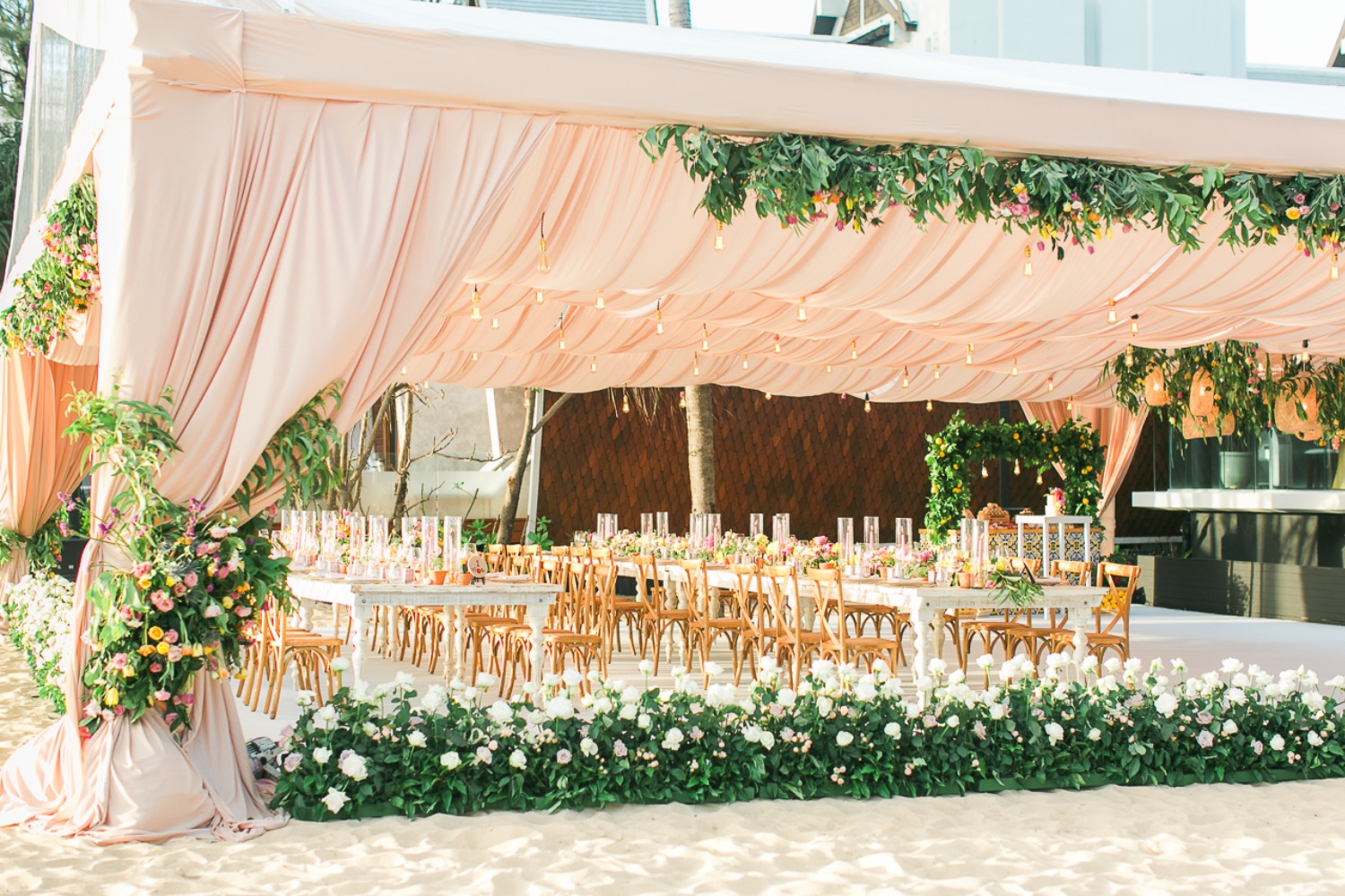 Outdoor tent reception on the beach