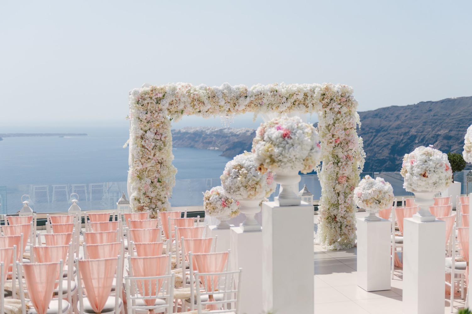 white and pink wedding ceremony decor